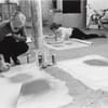 Andy Warhol in his studio during the creative process